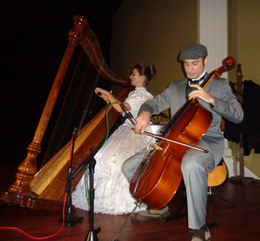 Anthony and Emily playing in a Christmas show