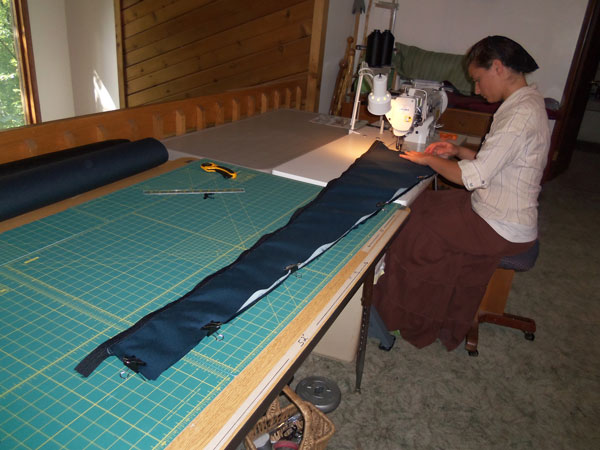 Emily sewing harp cases
